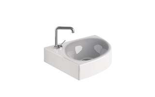 A corner washbasin for particularly small bathrooms